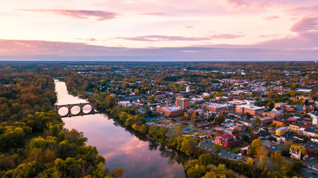 Aerial view of a Virginia river town at sunset